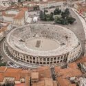 Aerial view of Arena di Verona, Italy. Image © Aleksandr Medvedkov via Shutterstock One Month to Go: Adaptive Reuse and Alpine Transport Upgrades Shape the Road to Milano Cortina 2026 - Image 5 of 12