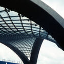 Glass Station, 1993. A bubble-like glass roof on four concrete arches, shaped through early computer-based structural optimization. Image Courtesy of The Shoei Yoh Archive Kumamoto Exhibition Explores Shoei Yoh’s Pioneering Timber Structures and Computational Design - Image 5 of 24