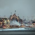 Burnt-down beachfront homes lie in ruins along the Mediterranean coast near Marseille, Bouches-du-Rhône, France, as powerful winds fuel a catastrophic wildfire during an intense heatwave, forcing evacuations and leaving widespread destruction across coastal communities. Image © Azwadafraz via Shutterstock Wildfires in Algeria Highlight the Scale of the Global Fire Landscape - Image 4 of 5