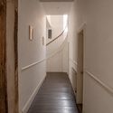 Bromley Hall corridor. Image Courtesy of Assemble Assemble to Transform Grade II*-Listed Bromley Hall into a New Creative and Light Industrial Workspace in London - Image 5 of 14
