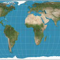 The world on Eckert IV projection. 15° graticule. Imagery is a derivative of NASA’s Blue Marble summer month composite with oceans lightened to enhance legibility and contrast. Image created with the Geocart map projection software. Image © Strebe via Wikimedia Commons A Proposal for a New World Map and Two New Sports Complexes: This Week’s Review - Image 2 of 54