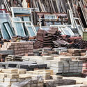 Stockyard of recycled building materials waiting for reuse. Image via NY Engineers City Governments Transform Industrial Buildings into Circular Construction Hubs in New York, London, and Brussels - Image 2 of 6