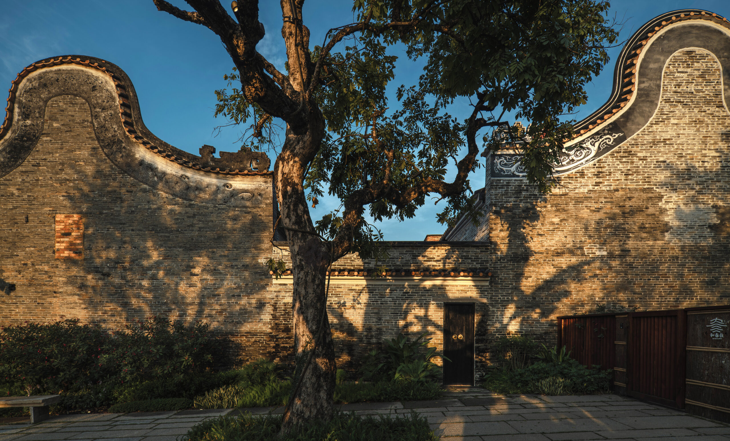 Exterior detail of a traditional courtyard house at the Langtou Village Inn.
